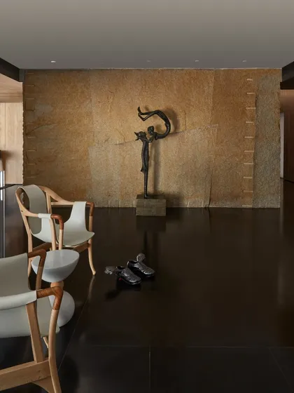 The Baid Residence, which graced the cover of Elle Decor India. This project is a 33,000 sq. ft. sanctuary that balances the chaos of the city with the serenity of the adjacent forest.