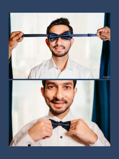 The playful side of getting ready. A fun shot with the bow tie before it's perfectly placed.