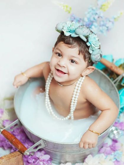 Splashing and smiling in the tub. I love the genuine expressions of joy that come from these playful sessions.