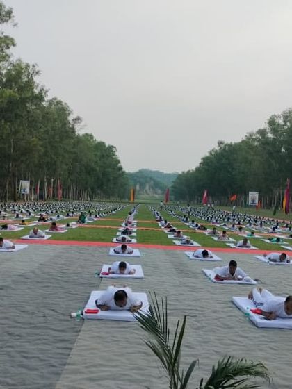 Another perspective of our International Yoga Day celebration, showing rows upon rows of dedicated yogis moving together. This was a day of immense pride, passion, and community connection.