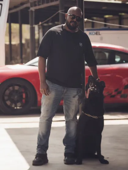 Standing proud with my dog. My goal is to help every owner feel this confident with their canine partner.