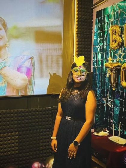 For this bridal shower, we projected a beautiful photo of the bride-to-be on the big screen while she posed in front of another decorated wall with 'BRIDE TO BE' foil balloons.