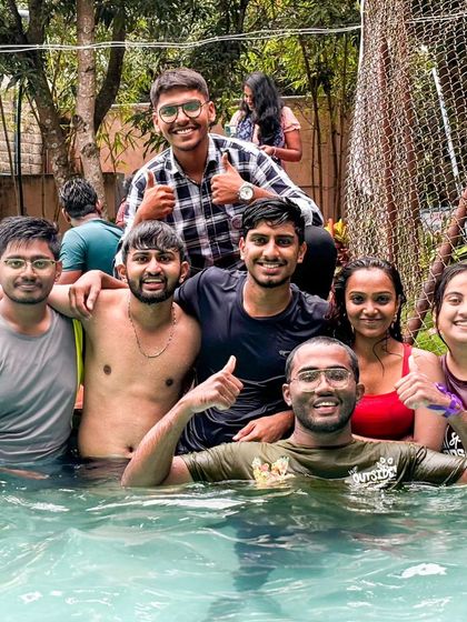 Thumbs up from the pool. A successful event with lots of happy faces.