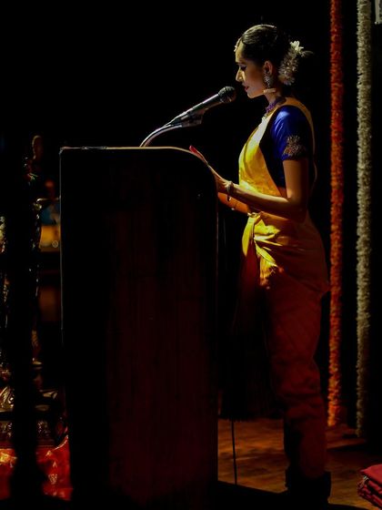 Addressing the audience is also part of the performance. Here I am at the podium, sharing the context of my piece 'Maam Pahi' before the recital.