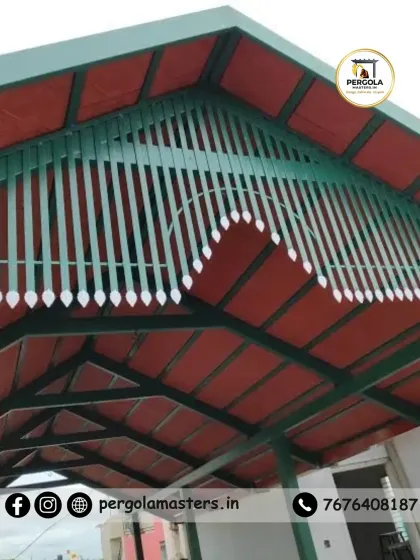 A close-up of a Mangalore tile roof with decorative green metalwork. This detail shot highlights the custom finishing touches that can be added to create a unique and personalized pergola design.