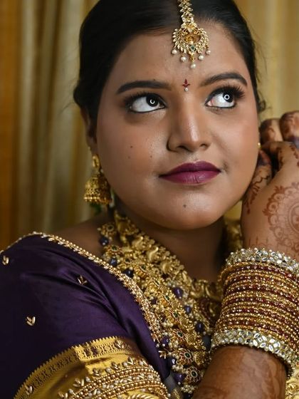 A candid moment of the bride getting ready. This shot captures the anticipation and excitement of the wedding day.