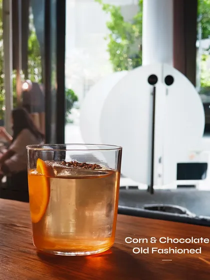 The Corn & Chocolate Old Fashioned, an unexpectedly delicious combination. The sweetness of corn and the richness of chocolate give this classic a modern, playful twist.