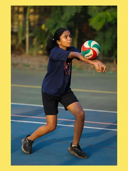A U-14 player practices her passing, showing great form and concentration. We focus on fundamentals to build a strong foundation.