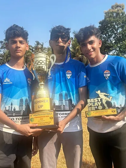 Our players holding the runner-up trophy from a previous Goa Football Festival, a moment that fueled their determination to come back and win the title.