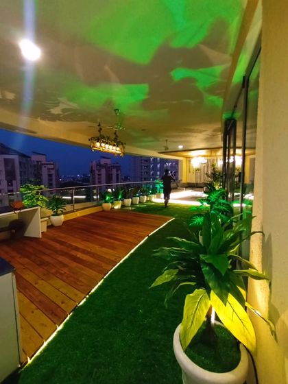 Another angle of the Rajkot balcony, showing the length of the space and how the different zones for seating and walking are defined by flooring and lighting.