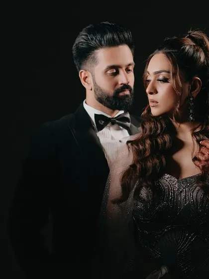 We craft portraits that are both elegant and full of emotion. Using dramatic lighting and a focus on connection, we create moody, sophisticated images that highlight the couple's powerful presence and chemistry, perfect for a glamorous cocktail night.