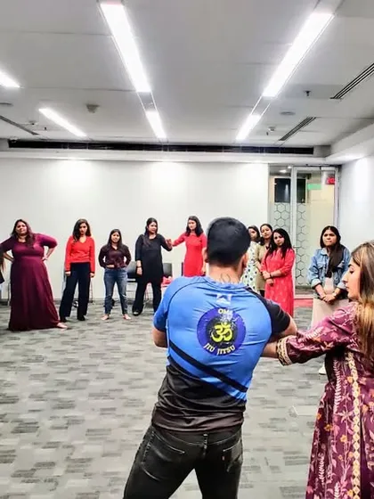 A wide shot of our interactive corporate seminar. I make sure everyone gets a chance to see and practice the techniques in a safe, controlled setting.