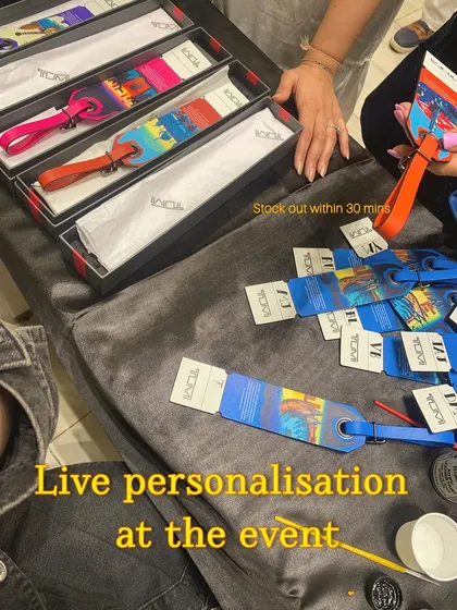 The demand at the TUMI event was wild. We ran out of the custom city-themed luggage tags within 30 minutes of starting the live personalization. It shows how much people love getting a unique, hand-painted item.