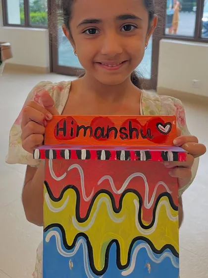 This vibrant and abstract nameplate is a unique and personal gift, made with love for Himanshu.