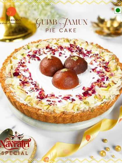 Experience the best of both worlds with our Gulab Jamun Pie Cake. We combine the traditional sweetness of soft gulab jamuns with a creamy, rich pie, garnished with rose petals and pistachios for a truly unique fusion dessert.