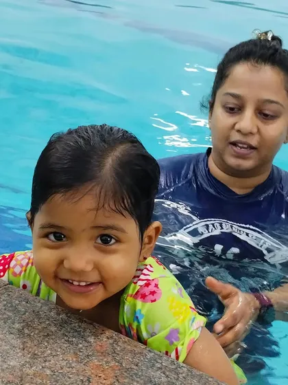 It's never too early to love the water. I create a safe and joyful space for our tiniest swimmers, like this little one, in our parent-and-toddler classes.