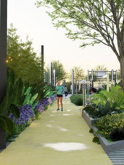 A pathway within Letizia Park, designed for walking and jogging. The yellow path is flanked by lush, colorful plantings and modern sculptural elements, creating a visually stimulating and enjoyable route for exercise.