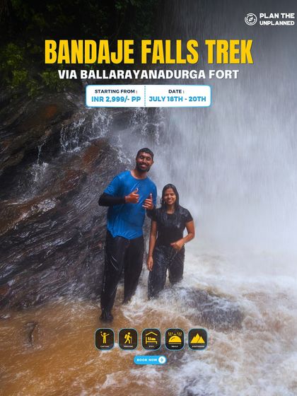 Two trekkers enjoying a refreshing moment in the Bandaje Falls.