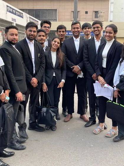 A candid team photo in the court corridors. We support each other through the long and often demanding days of litigation.