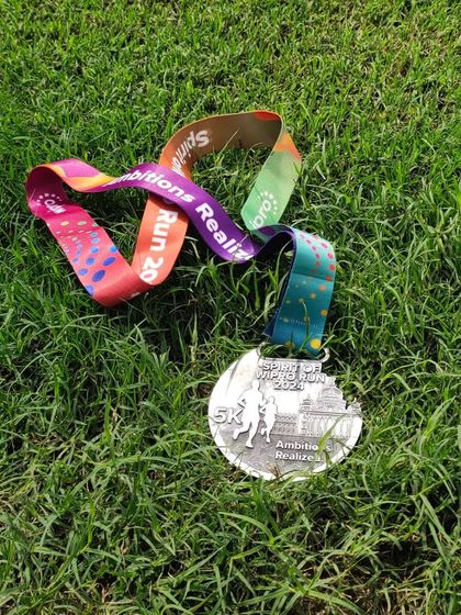 The Spirit of Wipro Run 5k medal. For many, this is the first step in their running journey. Our community welcomes beginners and provides the inspiration to aim for a 10k and beyond.