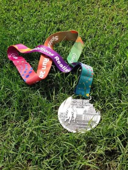 The Spirit of Wipro Run 5k medal. For many, this is the first step in their running journey. Our community welcomes beginners and provides the inspiration to aim for a 10k and beyond.