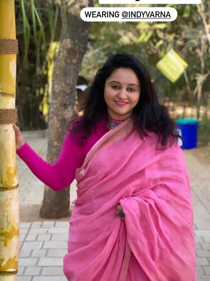 Wearing your personal colours can instantly make you look and feel more vibrant. Here, I'm wearing a pink saree that complements my skin tone, which is a key part of the colour analysis I do for my clients.