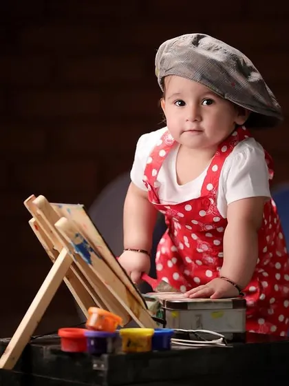 Another angle from our painter-themed baby shoot, showing how we create a complete scene for memorable and fun portraits.