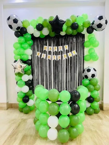 A full view of the football theme party decor, showcasing the structure and vibrant color combination for a soccer-loving kid.