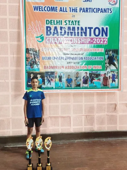 Our player Prasidhi Gupta with her three trophies from the Delhi State Badminton Championship 2022, where she won gold in Girls Singles, Girls Doubles, and Mixed Doubles U-15.