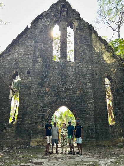 A group photo at the ruins of the old church on Ross Island, Andaman, a place rich with history.