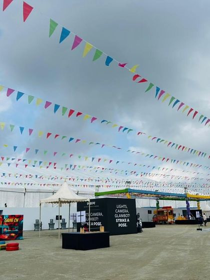 The expansive outdoor area at the Ola factory, fully equipped by our team for a large-scale event. This demonstrates our capacity to manage infrastructure for events with thousands of attendees.