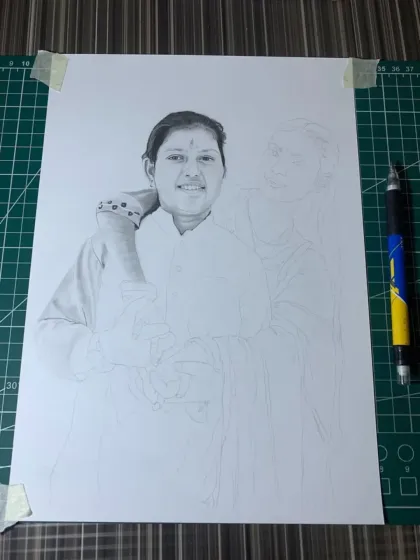 This A3 sketch of a mother and daughter was a commission from Maharashtra. It's a work-in-progress shot, showing how I build up the layers to create a touching family portrait.