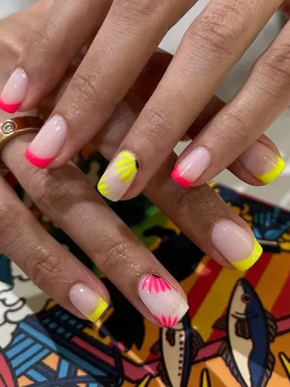 A full view of the vibrant and playful neon French manicure, perfect for anyone who loves a pop of color.