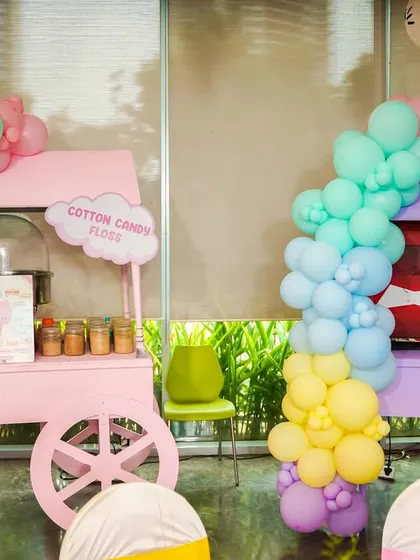 Every detail is themed to perfection. We provide specialty food carts, like this pastel popcorn and cotton candy station for a Hello Kitty party, that not only serve delicious treats but also add to the overall aesthetic.