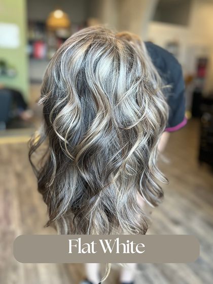 A Flat White inspired look, featuring bright, creamy blonde highlights. This is a high-contrast look that is bold and beautiful.
