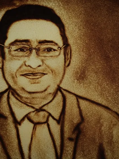 A sand portrait created during a live performance for Girish Electrical Company. Sharing the stage with celebrities like Malaika Arora and Aman Yatan Verma at high profile corporate events is part of my experience as a professional entertainer.