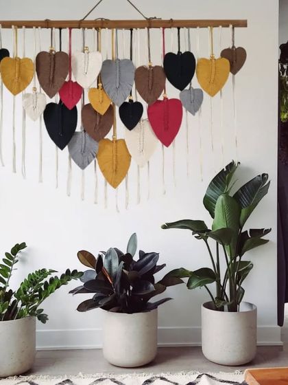 Infuse your living space with warmth and tranquility. This captivating macrame leaf hanging, styled with indoor plants, creates the ultimate cozy home vibes.