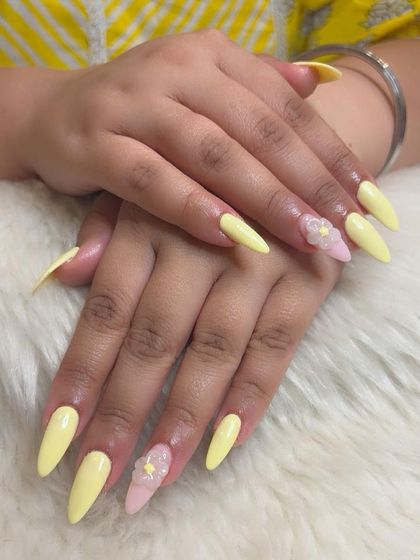 Both hands together, showing the complete cheerful and delicate nail set.