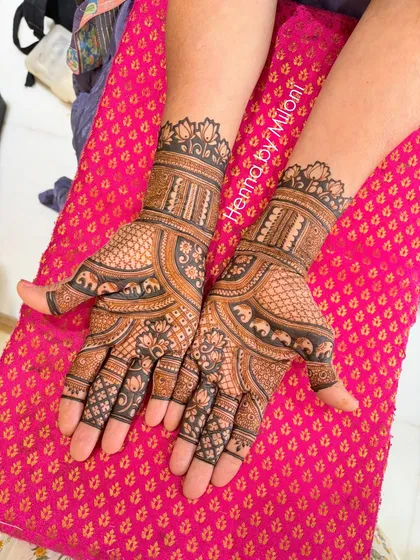 A classic and clean design featuring rows of elephants and lotus flowers. This style is perfect for someone who loves traditional motifs without complex figures.