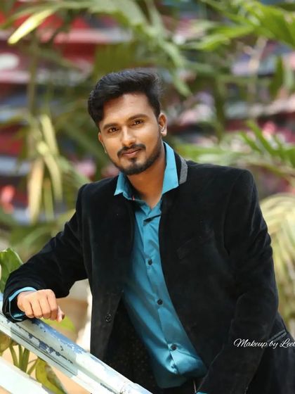 Another look from the male actor's photoshoot, showcasing a professional and clean appearance suitable for his portfolio.