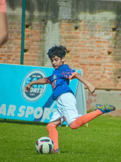 Samarth in action, demonstrating the powerful left foot strike that makes him a game changer on the field. His through passes are a key part of our team's attack.