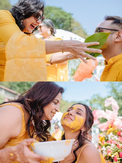 Mothers and family members lovingly apply turmeric to the bride and groom, creating heartfelt and memorable candid moments.
