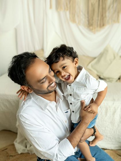The same sunny boy, sharing another huge laugh with his dad. Their bond is so clear and wonderful to see.
