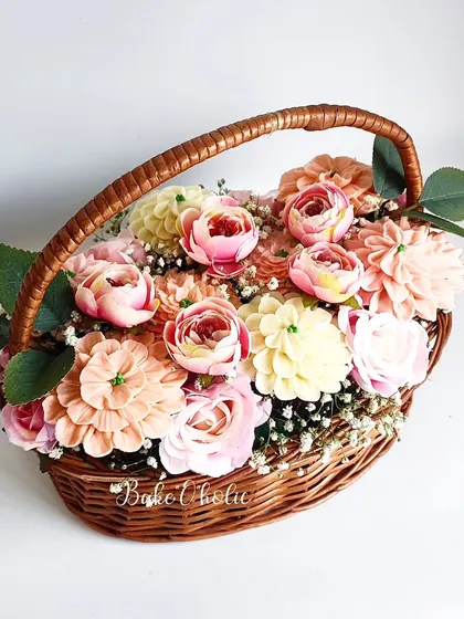 This khoobsurat cupcake bouquet is one of my favorite ways to make someone's day special. Each flower is a handcrafted cupcake, arranged in a lovely basket to create a gift that's as beautiful as it is delicious.