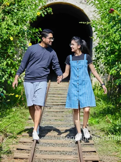 A casual walk along old railway tracks surrounded by nature. We find unique spots like this to add variety and a sense of adventure to your pre-wedding album.