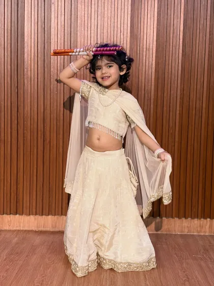A beautiful portrait of one of our youngest dancers in an elegant cream-colored lehenga. We love seeing our students dressed up and feeling proud during our festive sessions.
