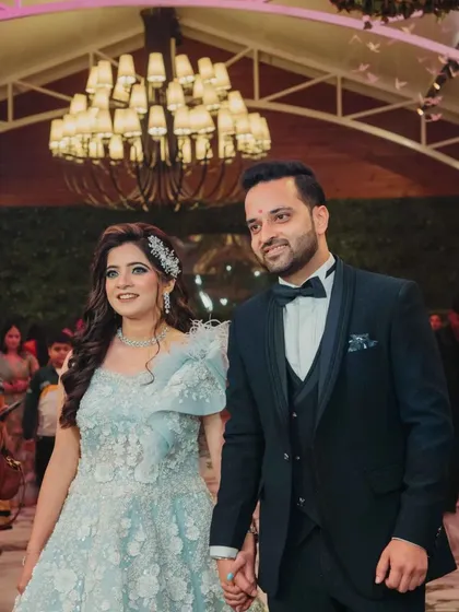Another shot of the couple's grand entrance. The bride's makeup is designed to look stunning from every angle.
