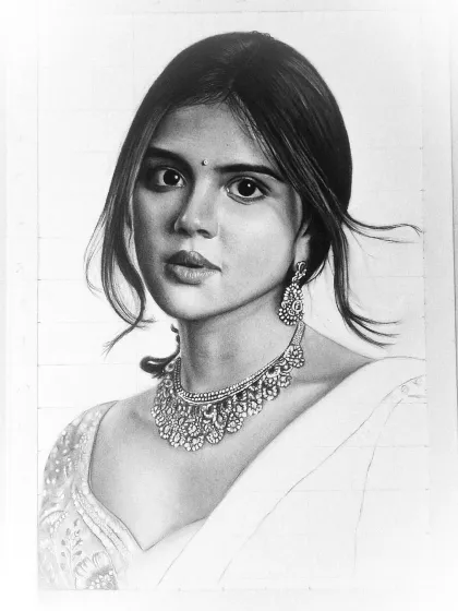 The portrait of Kalyani Priyadarshan nearly finished, with just the saree left to shade.