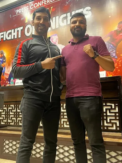 With another fighter at the FOK press conference.