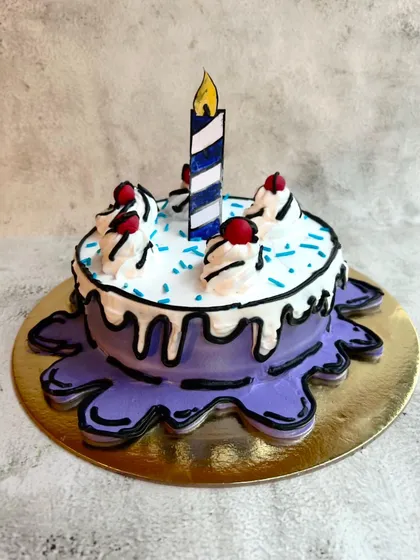 We love hopping on fun trends, and this 2D Cartoon Cake was a joy to create! This cake is designed to look like a drawing, with bold black outlines that make it pop. This one was a Zesty Belgian Chocolate flavor, but we can create this comic book effect on any of our cakes.